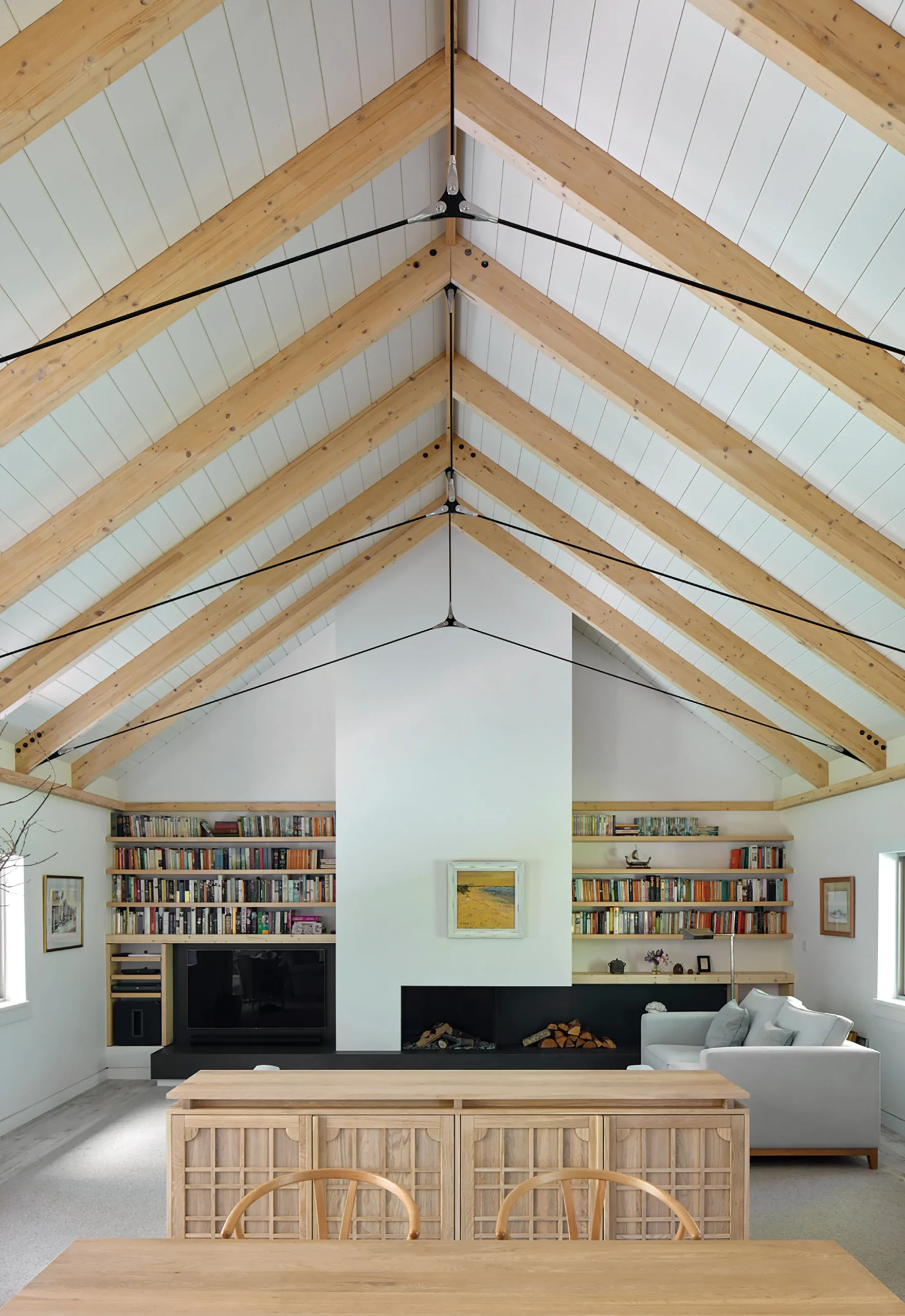 Inside of a house with vaulted wooden ceiling 