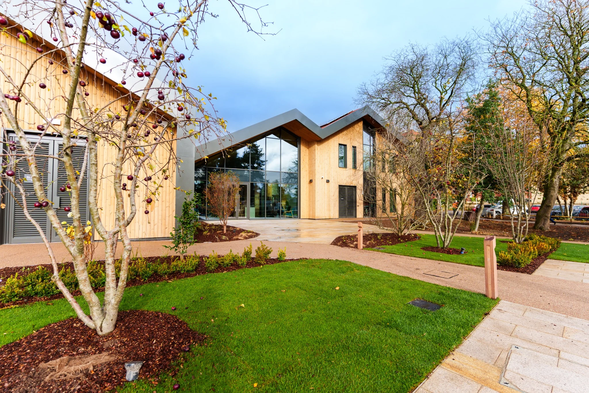 A timber building with top to floor windows