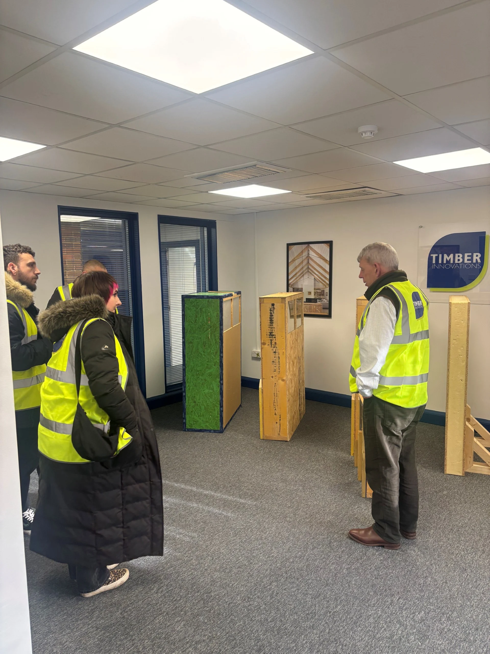Attendees looking at the different Larsen products.