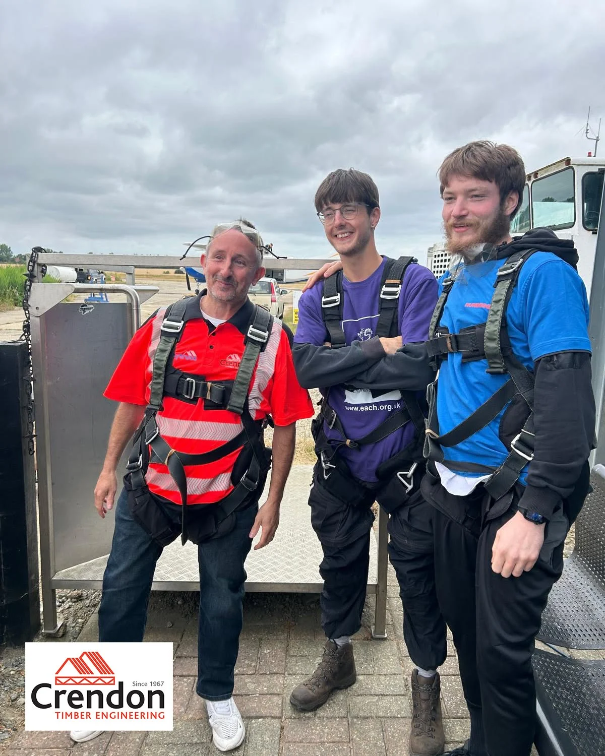 Group of skydivers standing for a photo